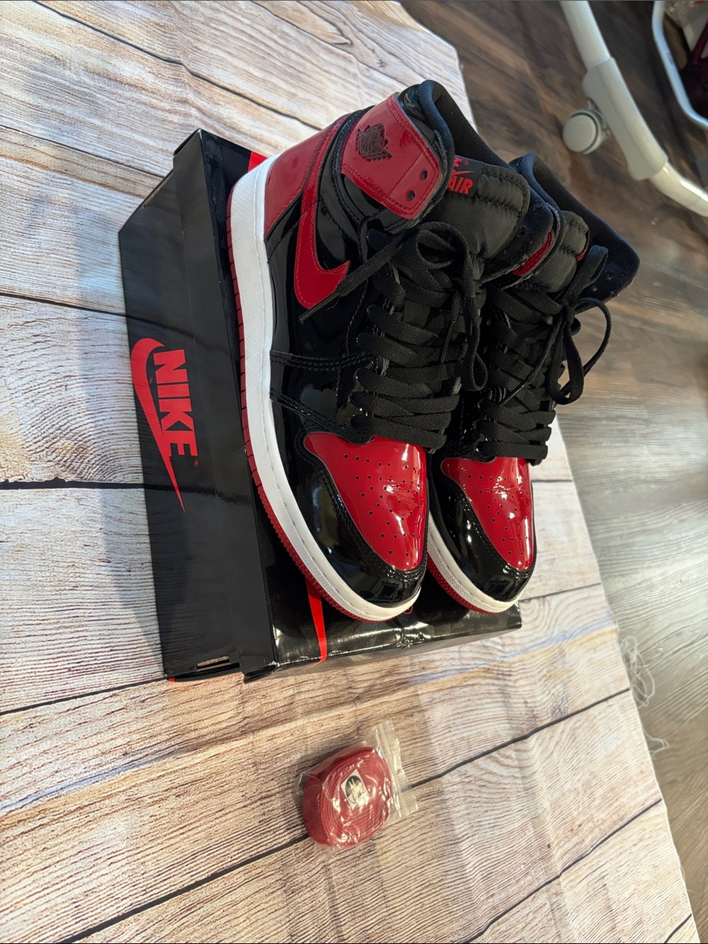 Nike Air Jordan 1 Retro High OG Black/Red Patent Leather Sneakers